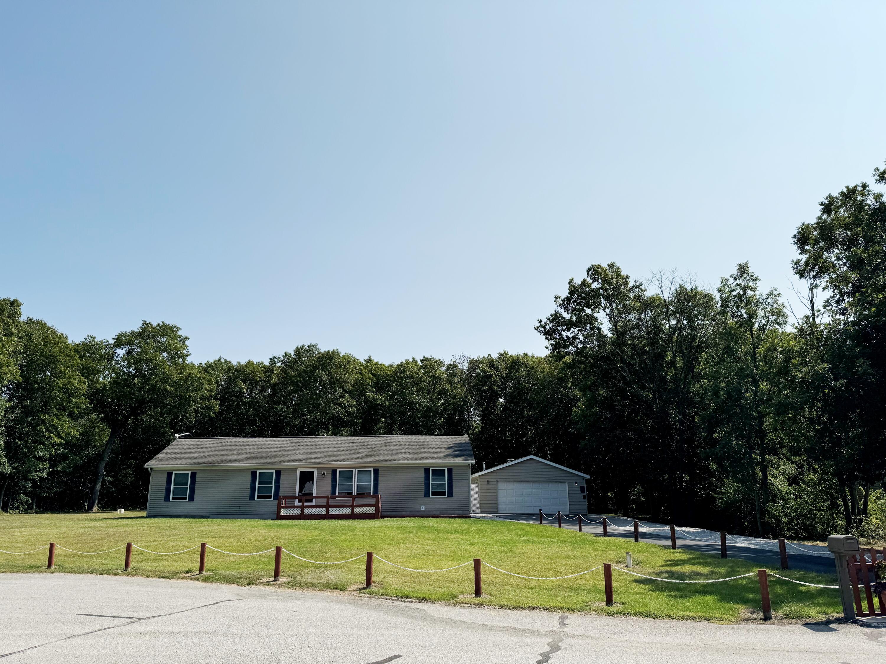 a view of a house with a big yard