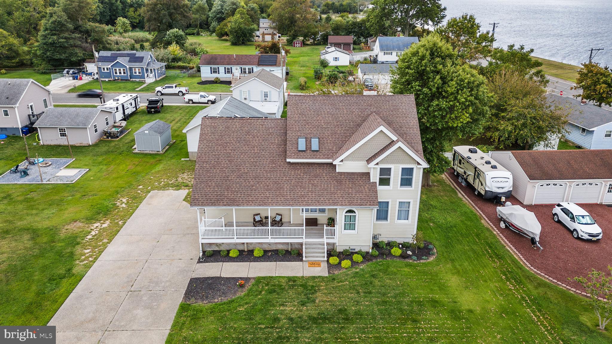 an aerial view of a house with garden