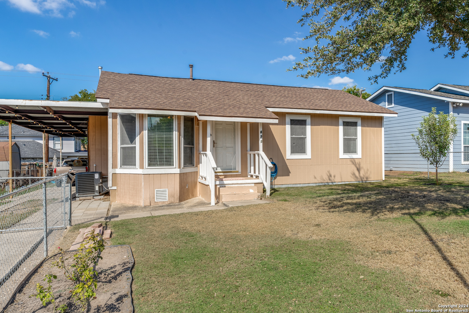 a view of a house with a patio