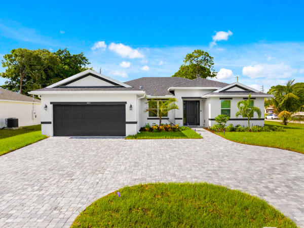 a house with garden in front of it