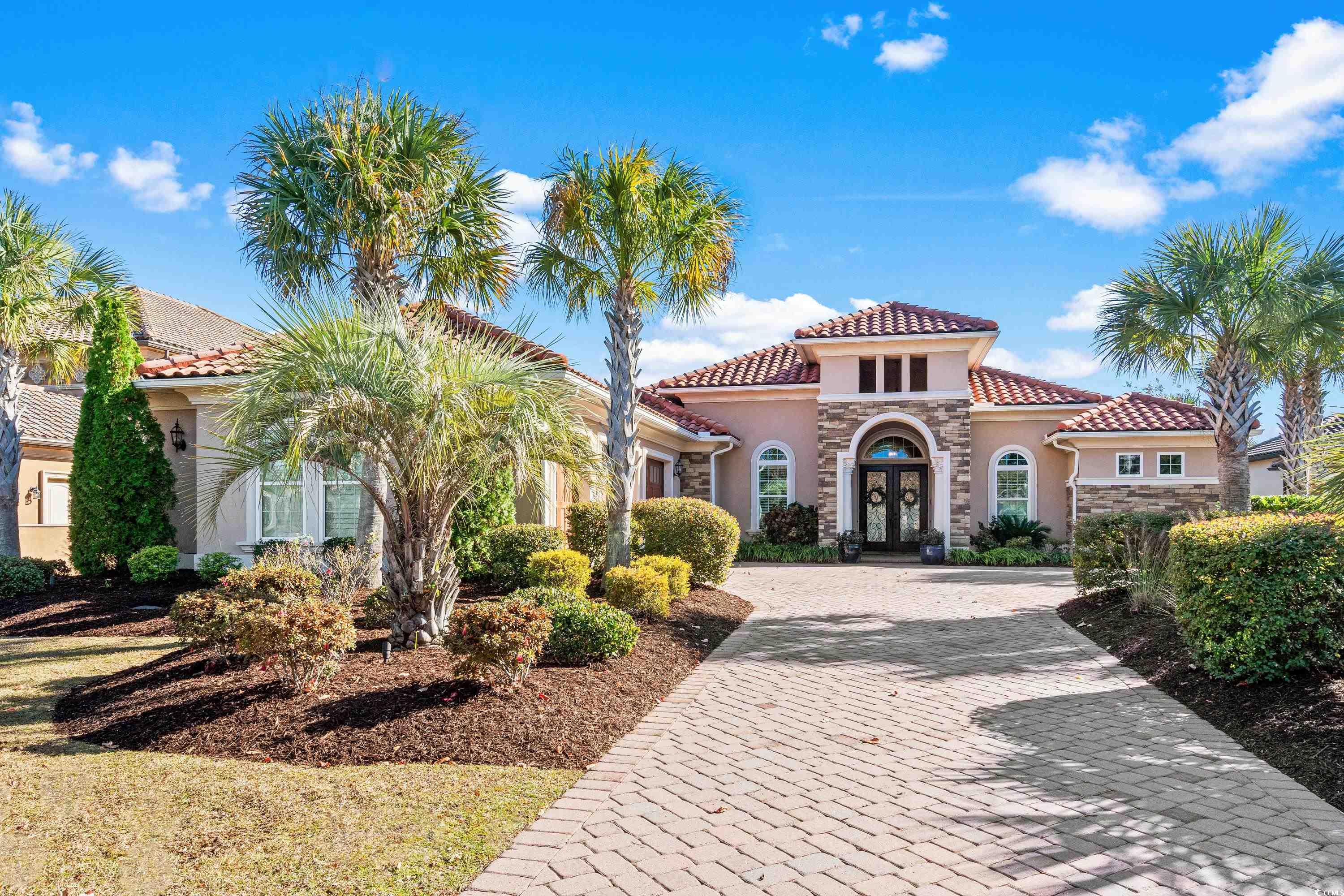 Mediterranean / spanish home with french doors