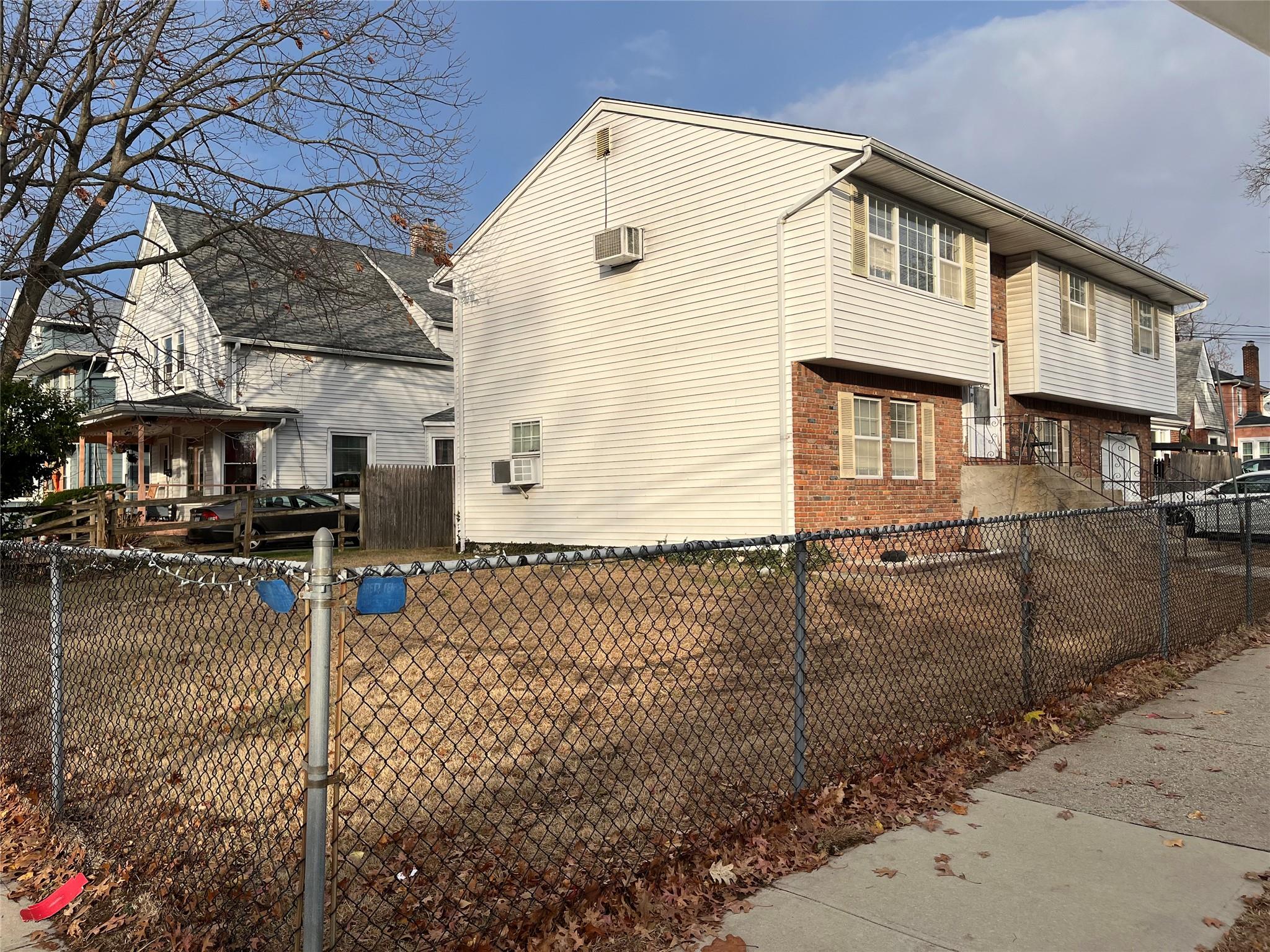 a front view of a house with parking