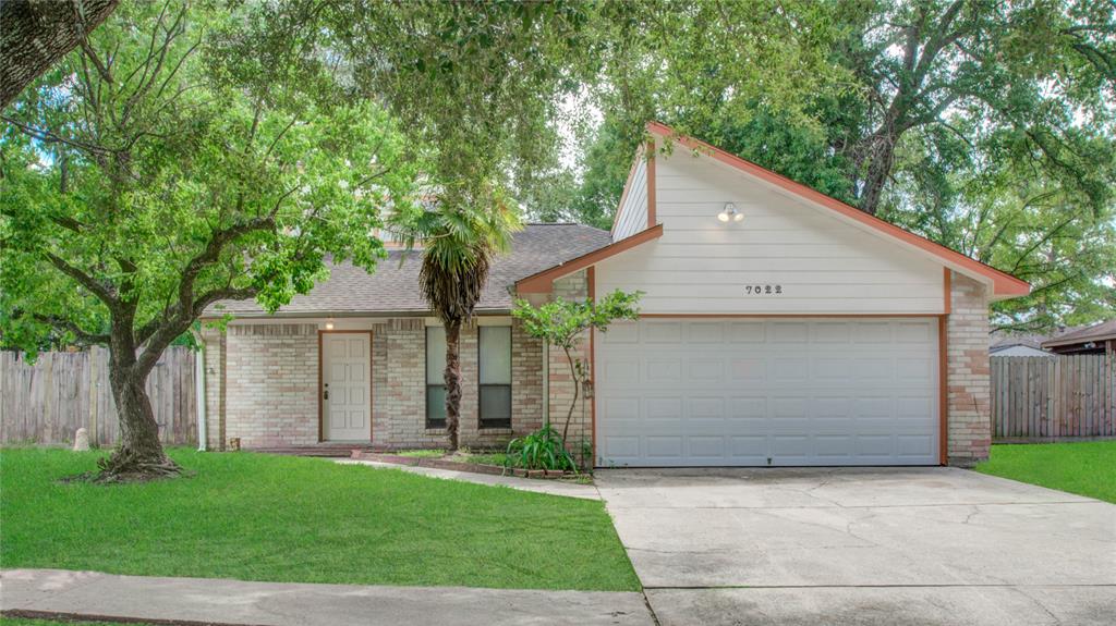 front view of house with a yard