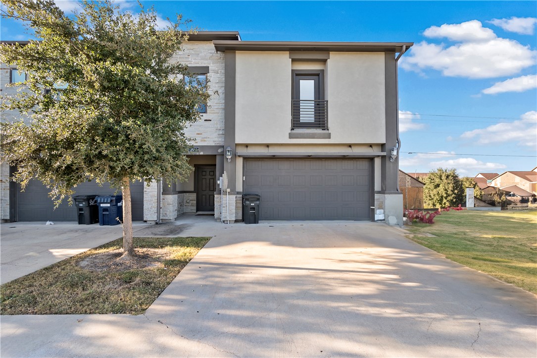 Two garage and ample driveway space for parking fo