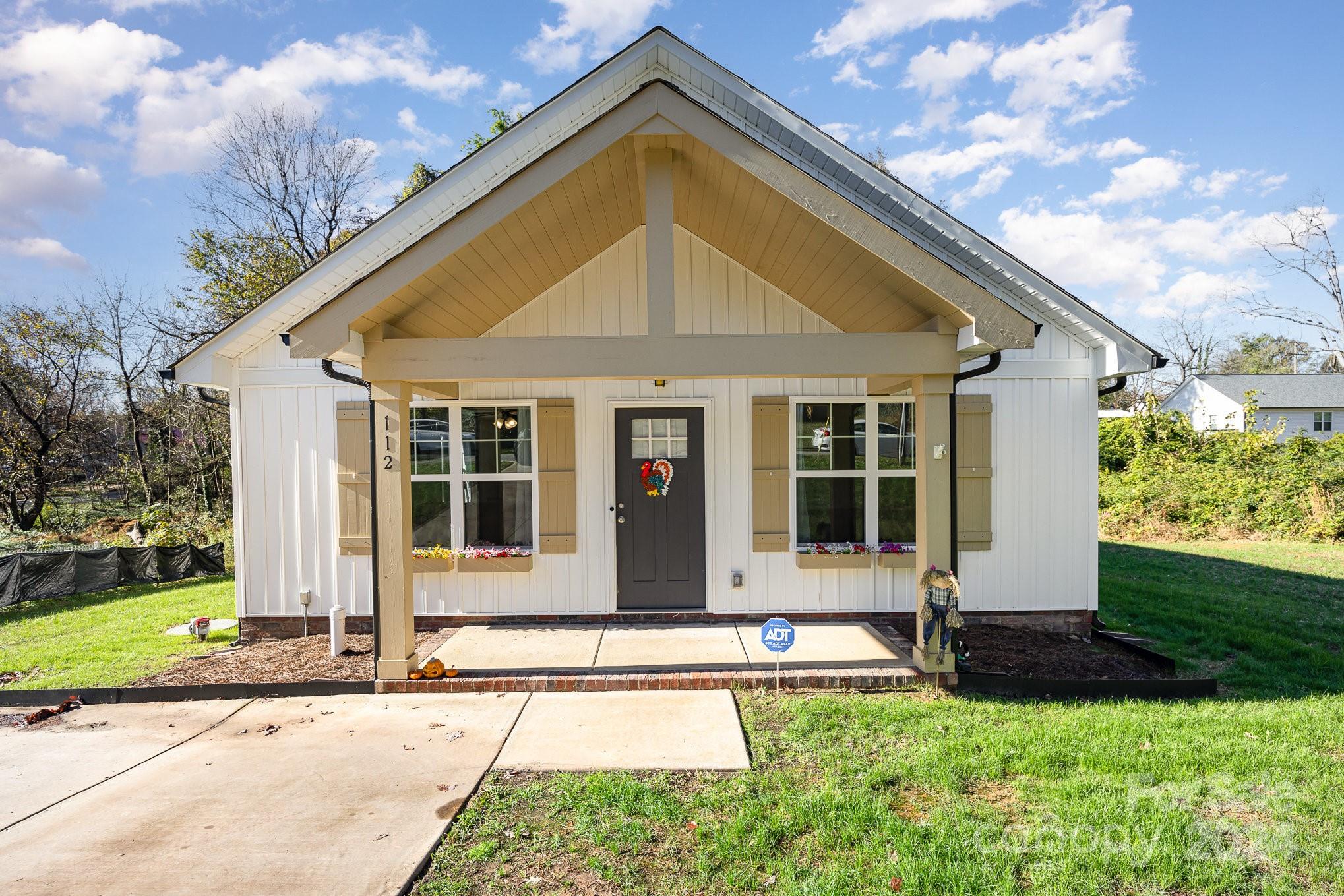 a front view of house with yard