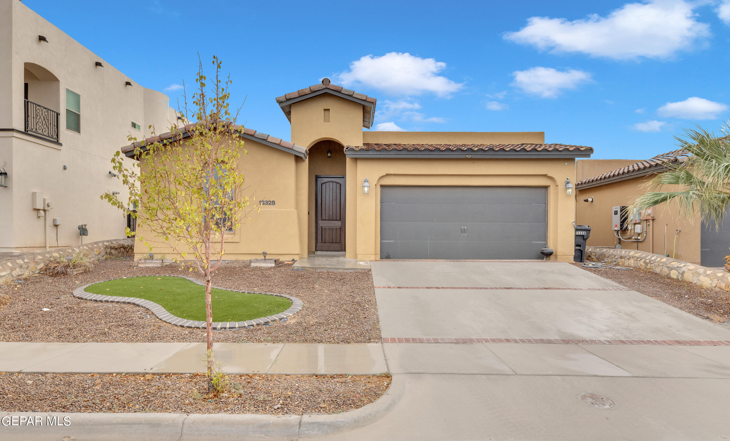 a front view of a house with entertaining space