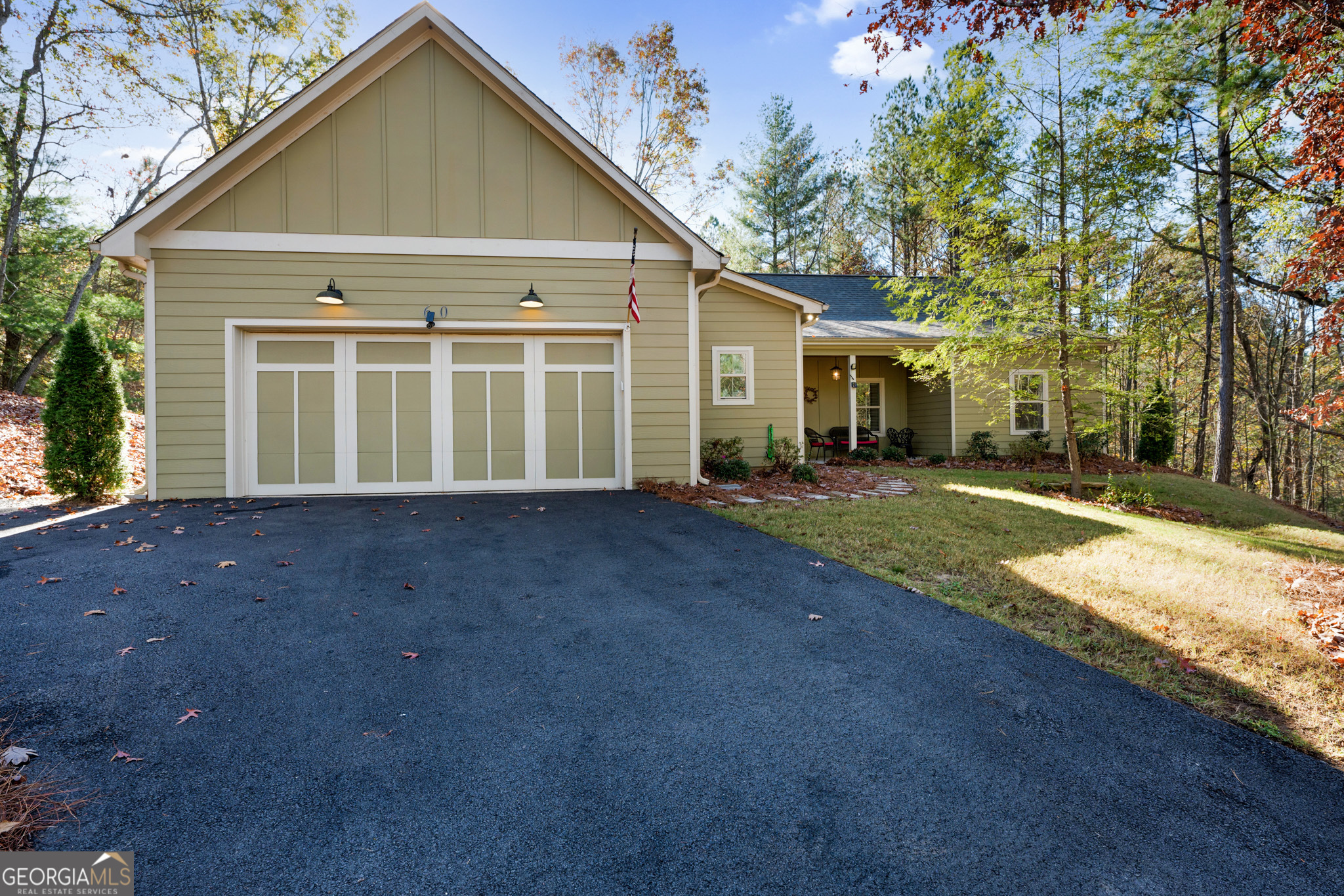 front view of a house with a yard