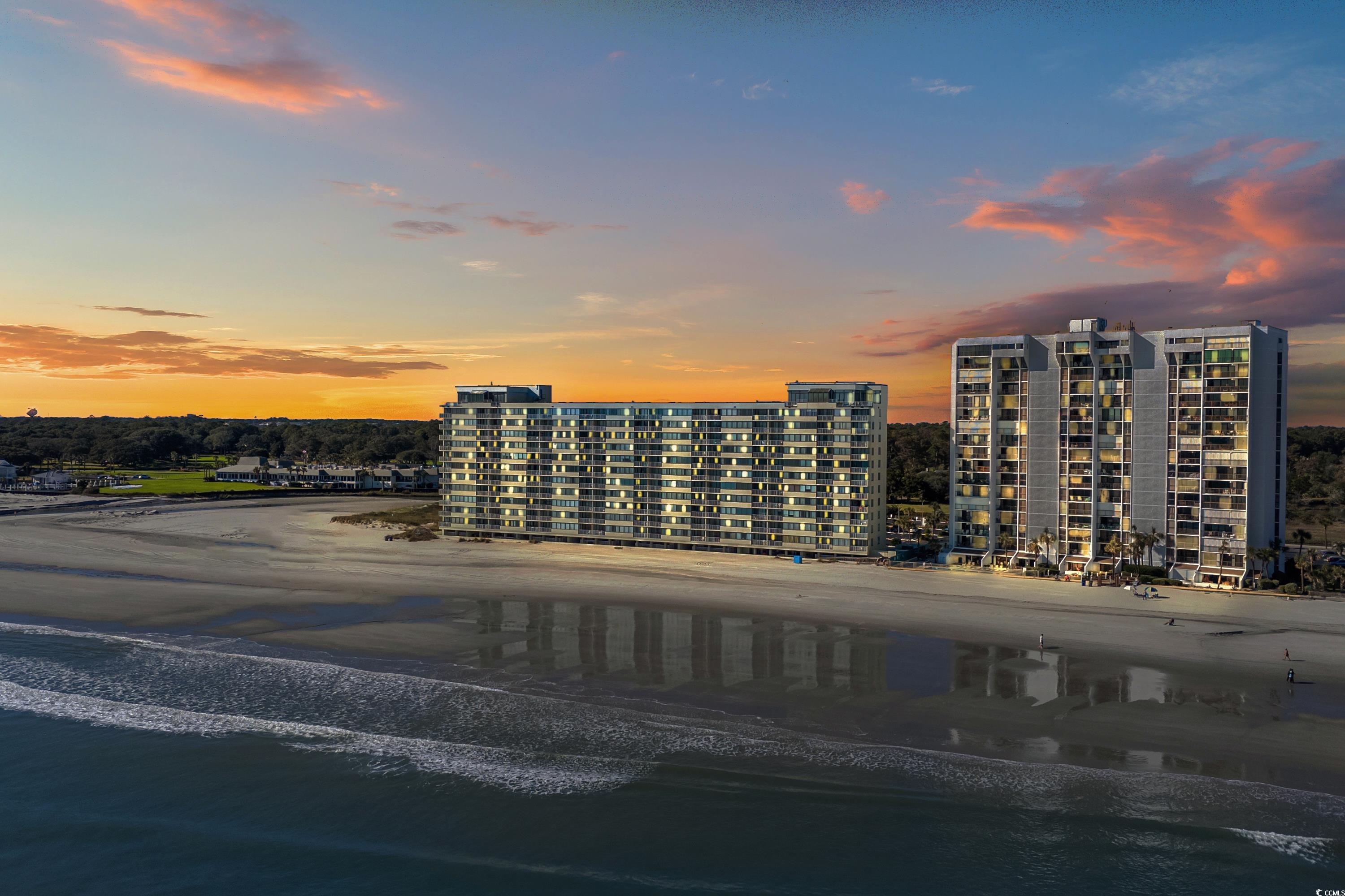 Outdoor building at dusk with a water view