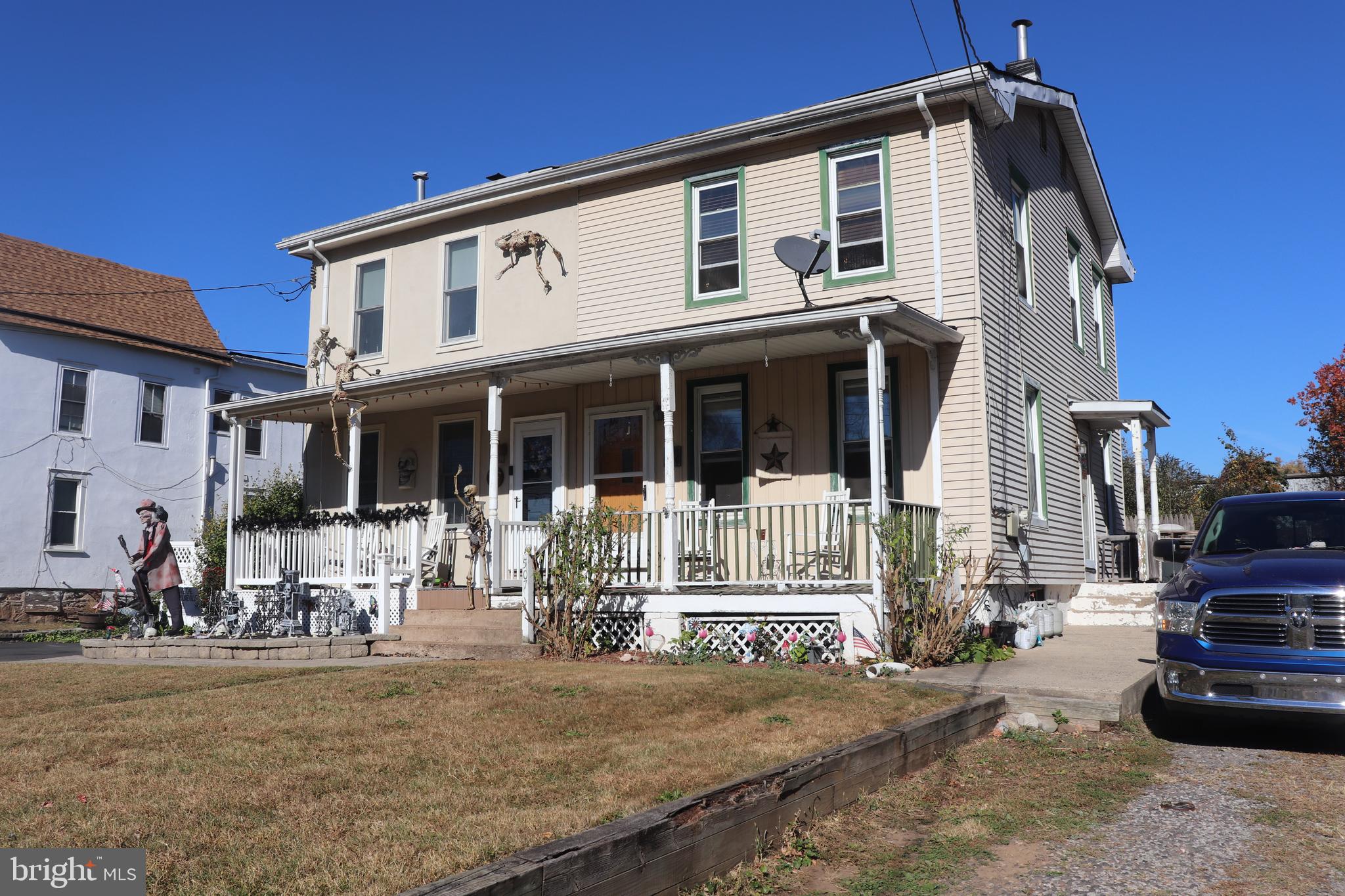 a front view of a house with patio