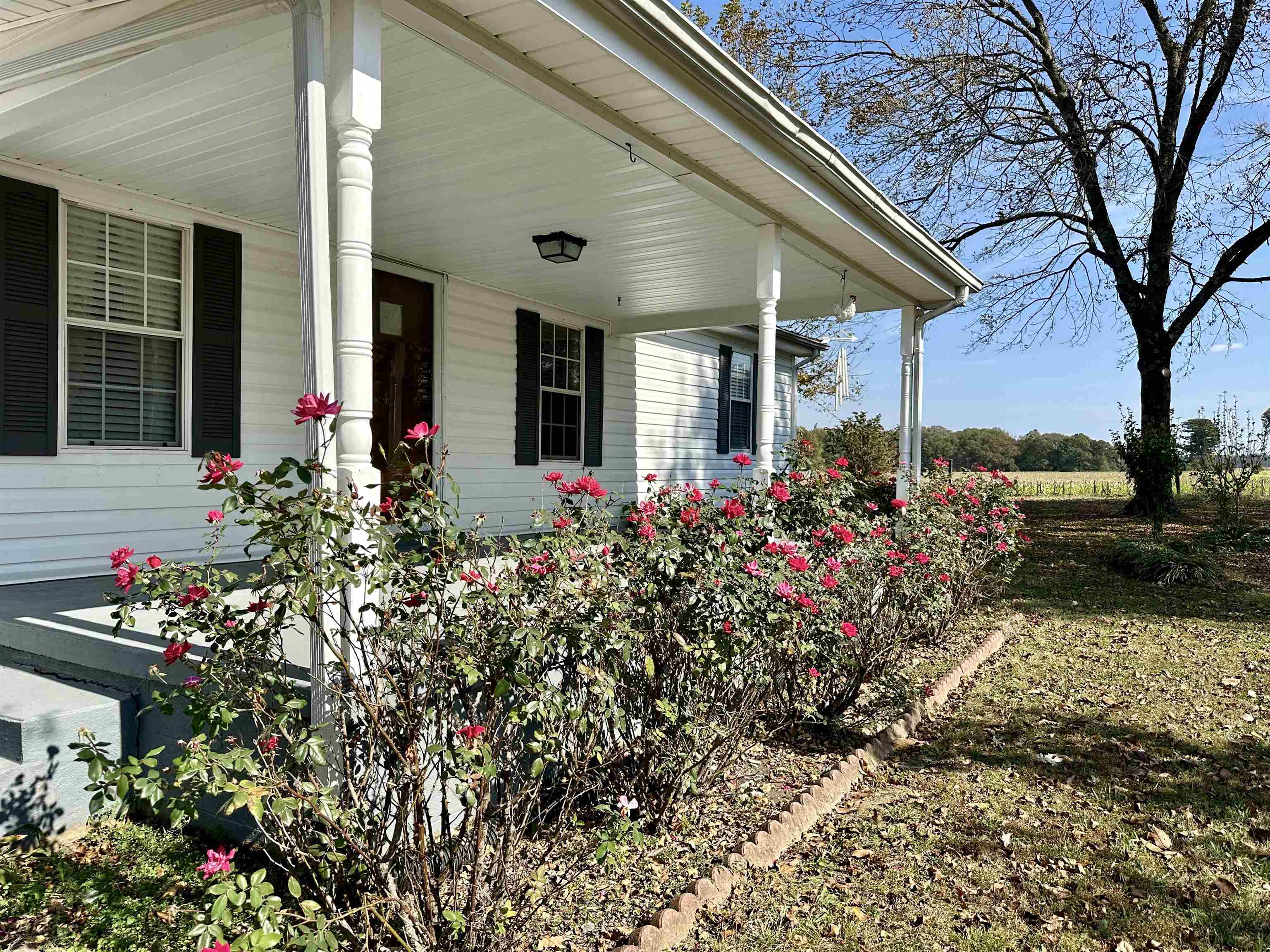 Exterior space with a porch