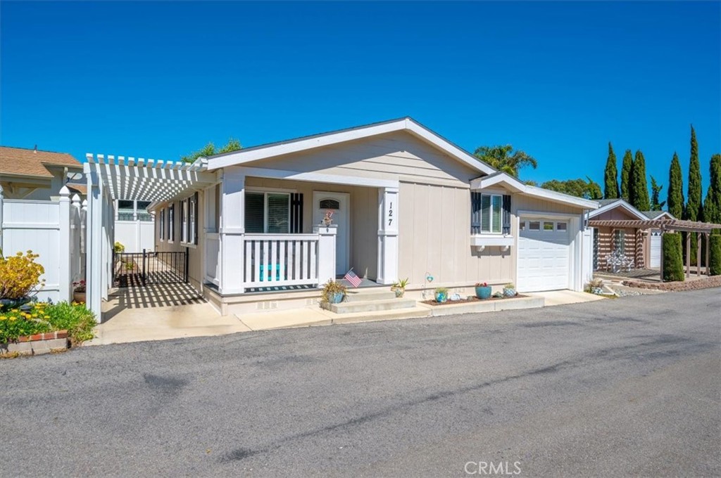 a front view of a house with a garage