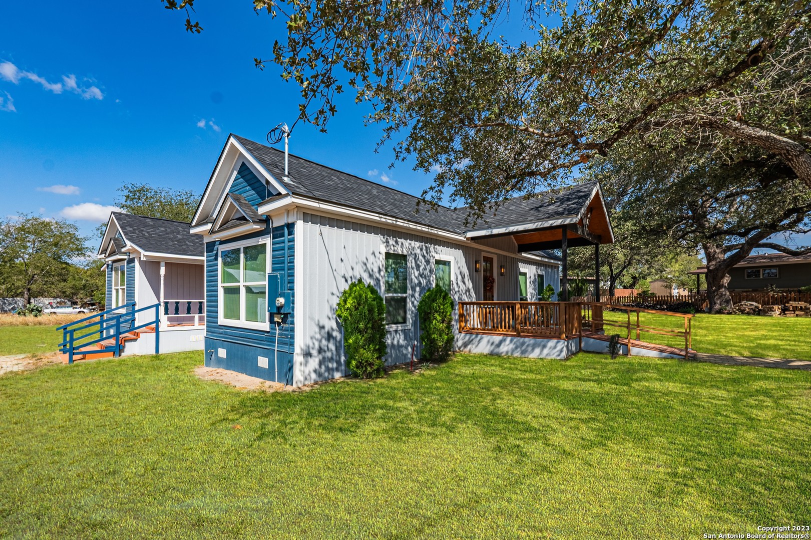 front view of a house with a yard