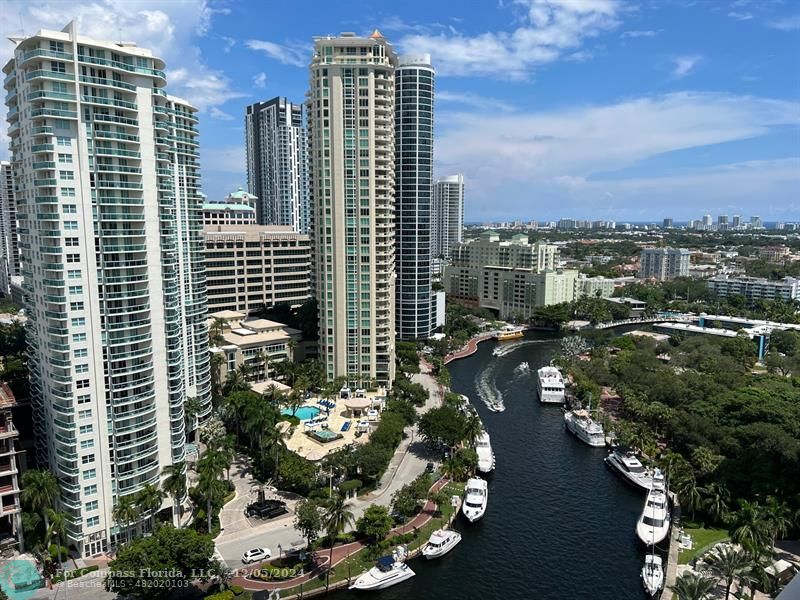 a view of a city with tall buildings