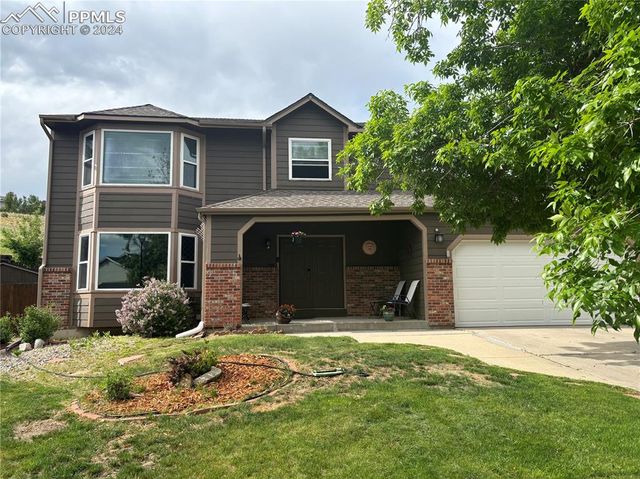 $589,900 | 7410 Hickorywood Drive | Briargate