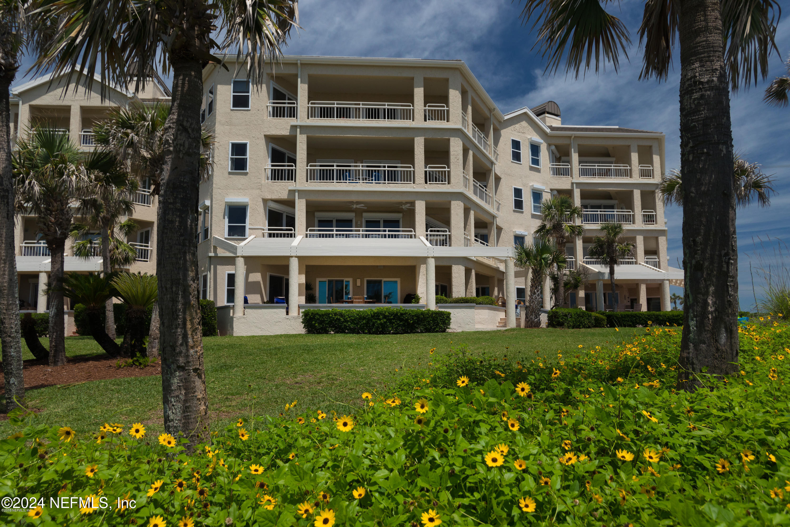 front view of a building with a yard