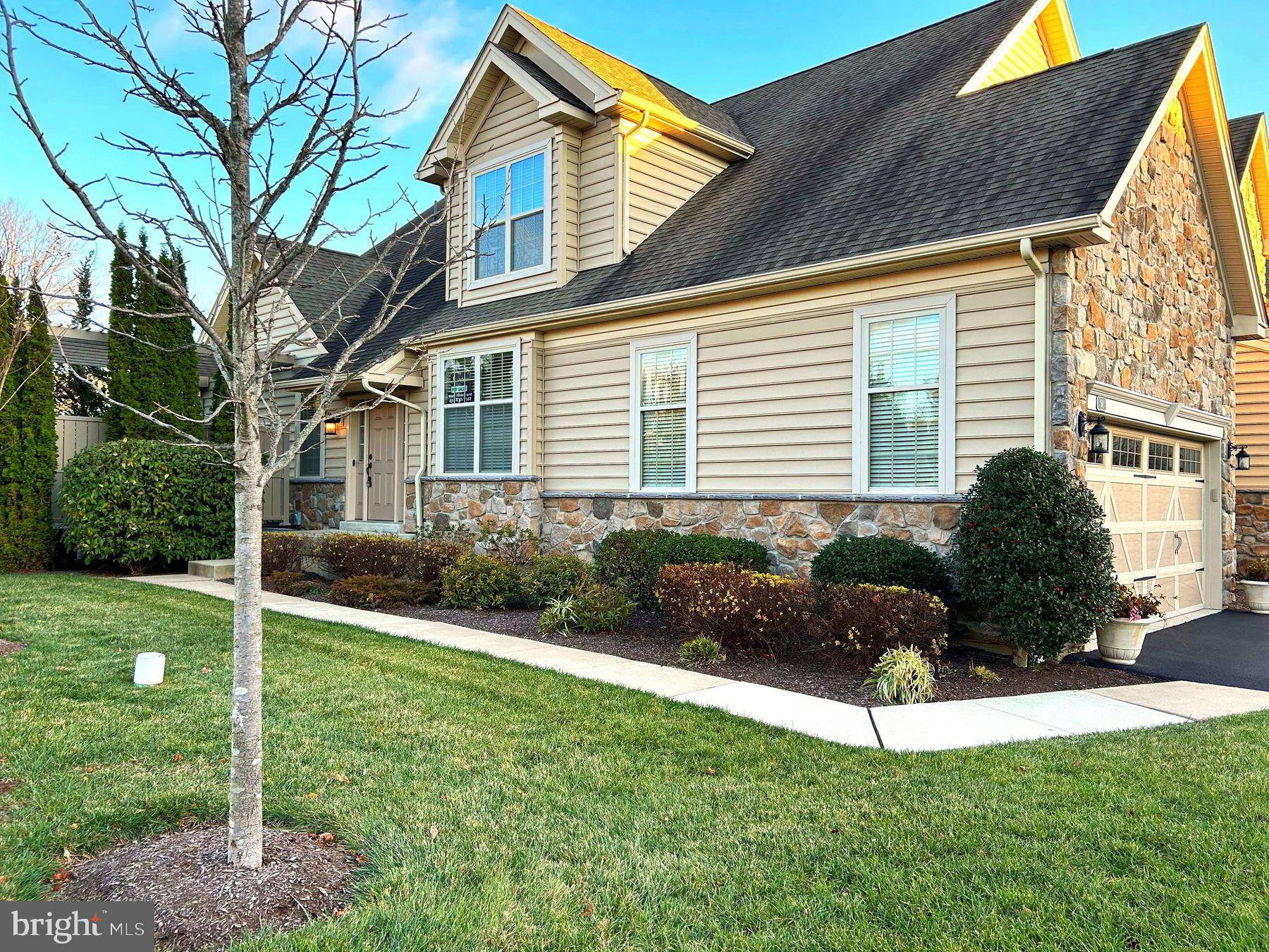 a house view with a garden space