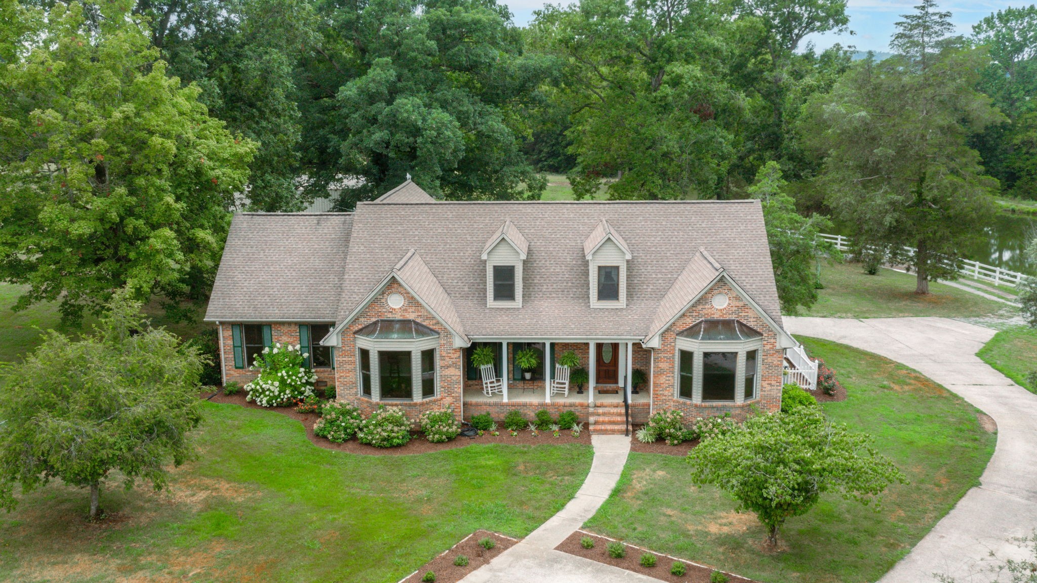 a aerial view of a house with garden