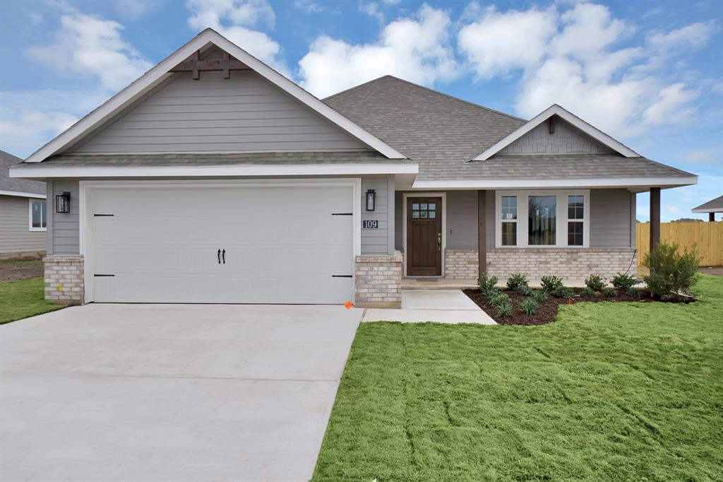 a front view of house with yard