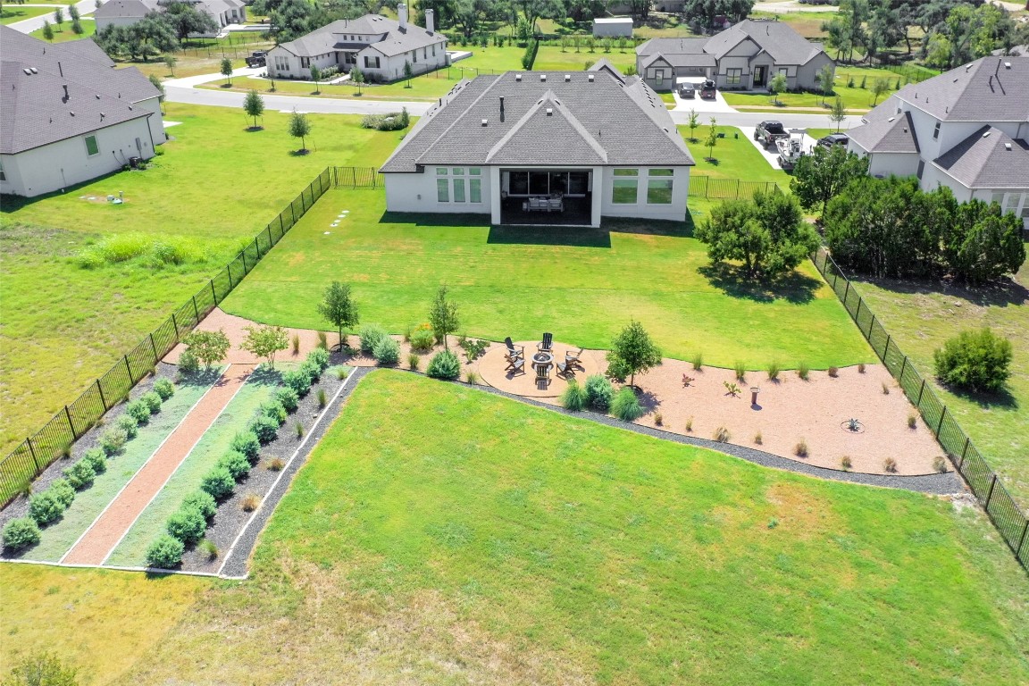 a view of a garden with swimming pool