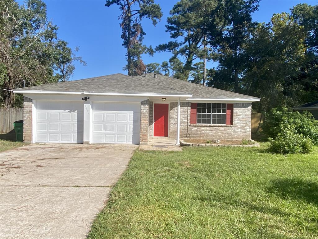 front view of house with a yard