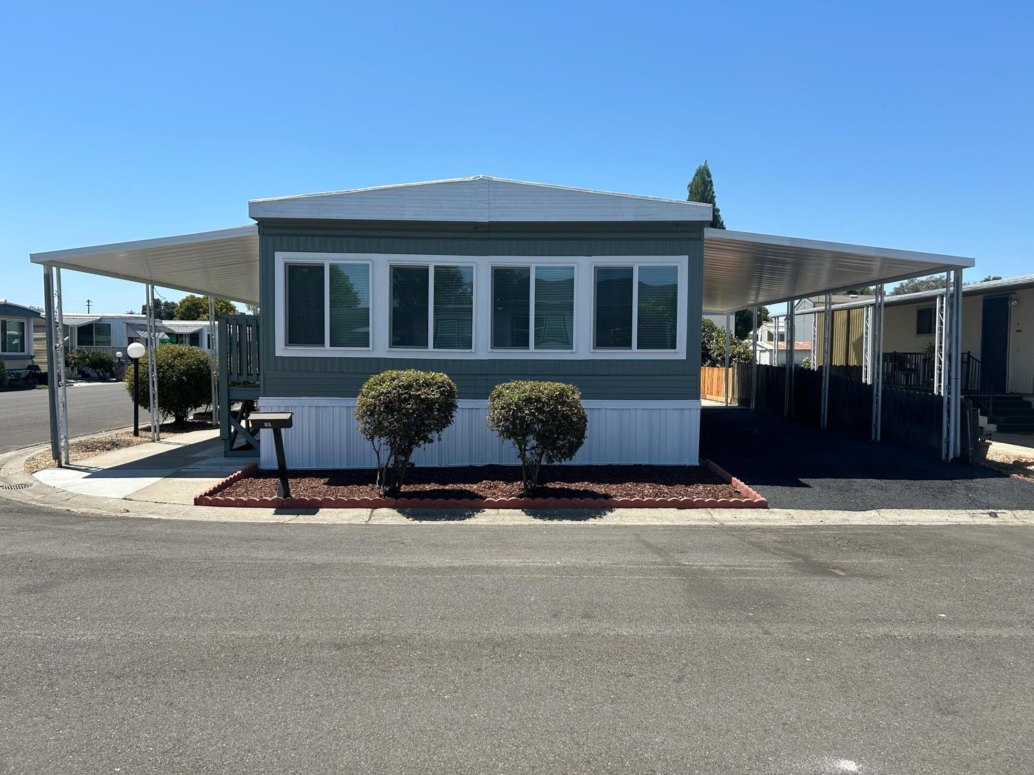 a front view of a house with a porch