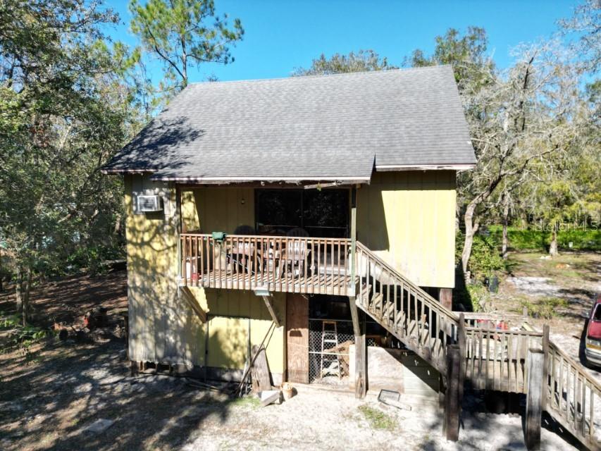 2001 STILT HOME ON THE RIVER