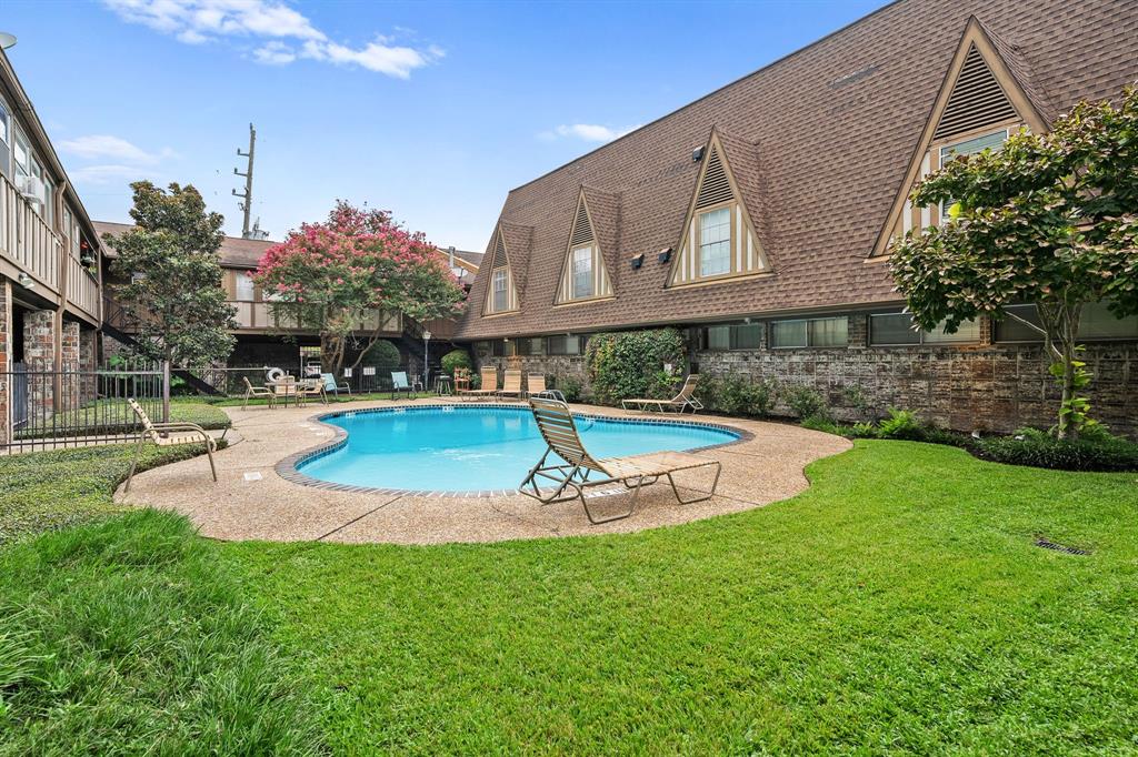 a view of a house with a swimming pool