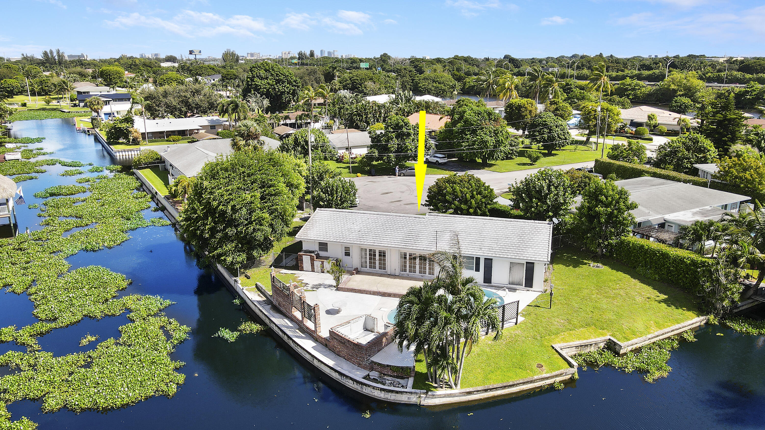 an aerial view of a house with a garden