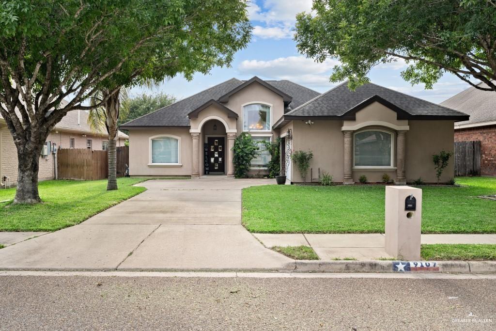 View of front of house featuring a front lawn