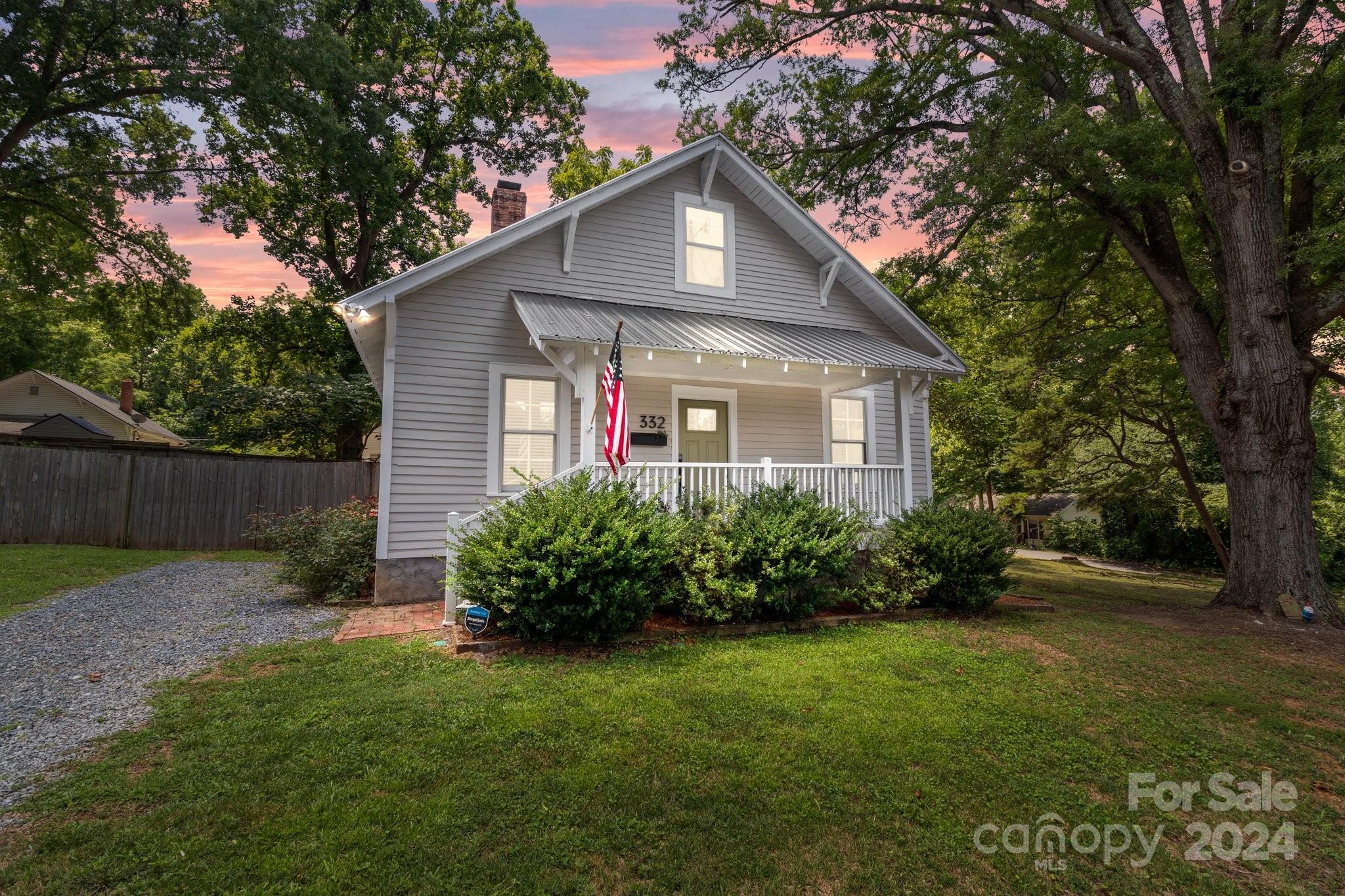 a front view of house with garden