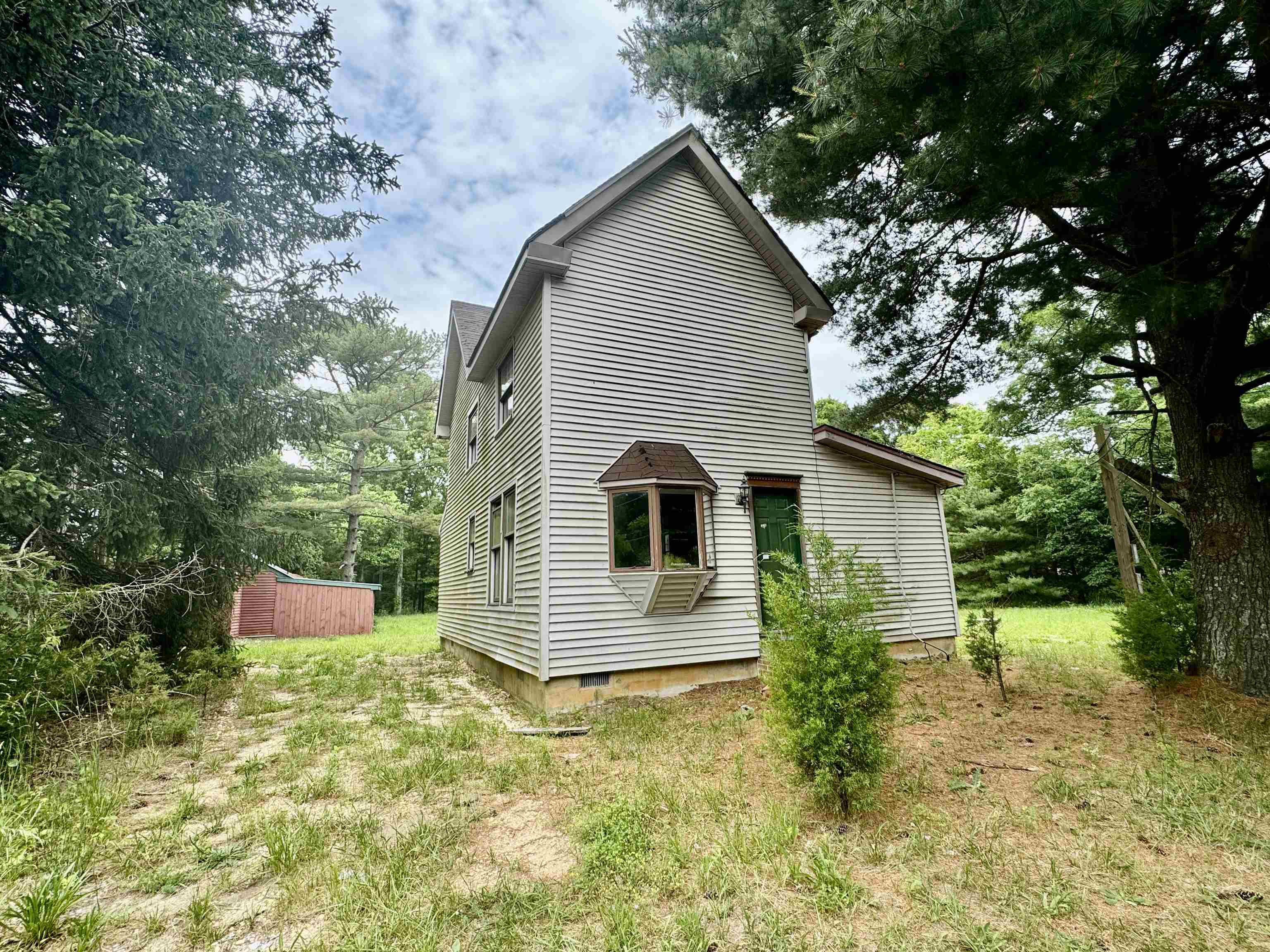 a front view of house with yard