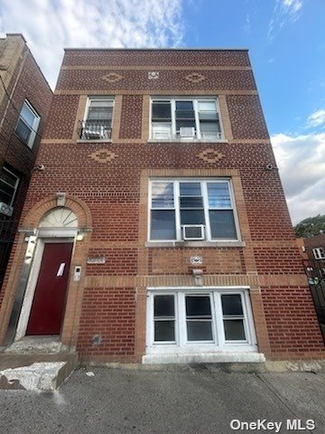 a large brick building with many windows