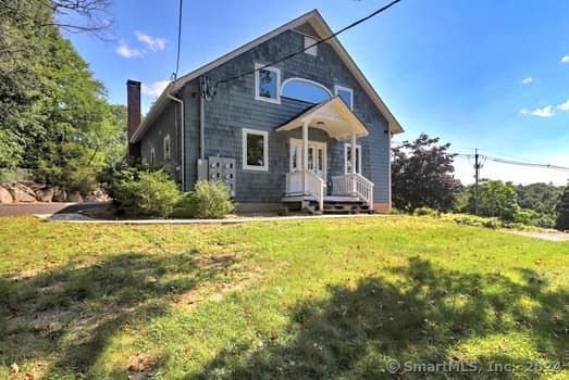 a front view of house with yard