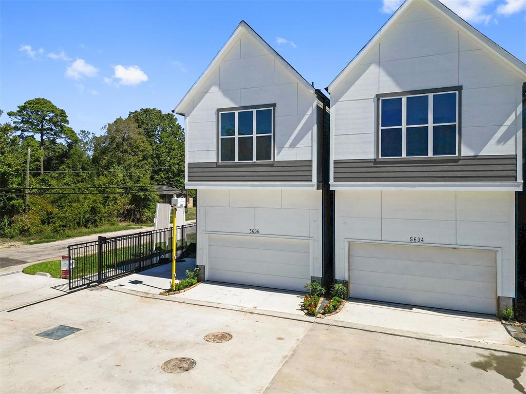 a house with trees in front of it