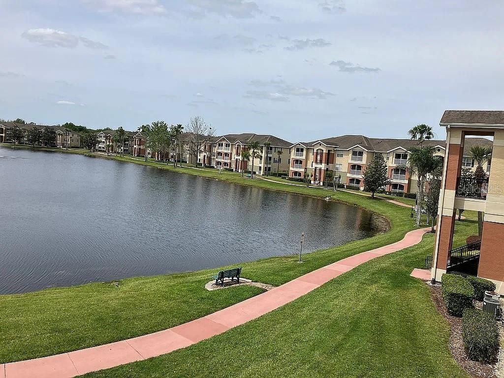 a view of a lake with a city