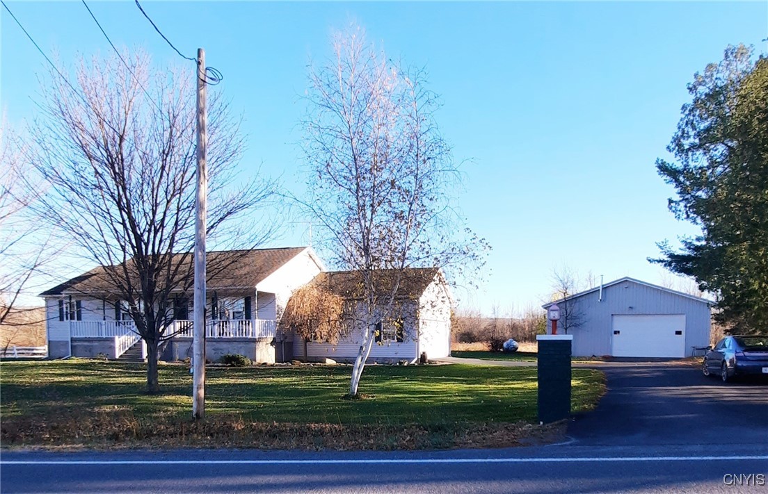 Frontal view of Ranch, w/2car garage and 36' x 48'