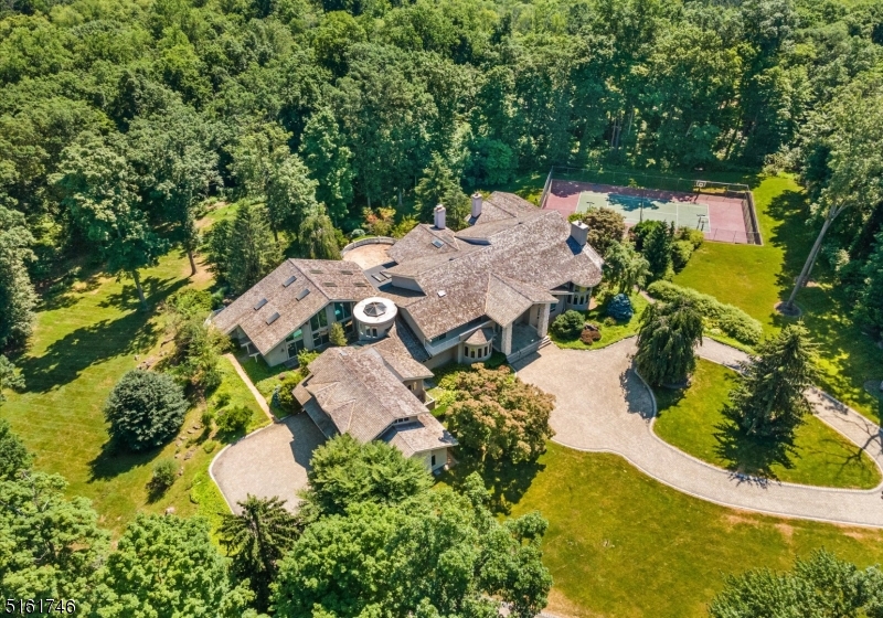 an aerial view of residential house with outdoor space