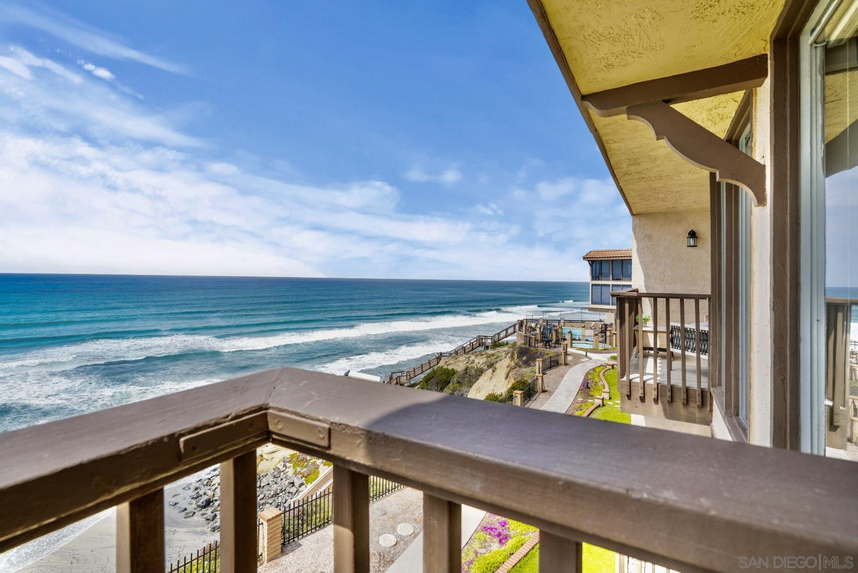 a view of a ocean from a balcony