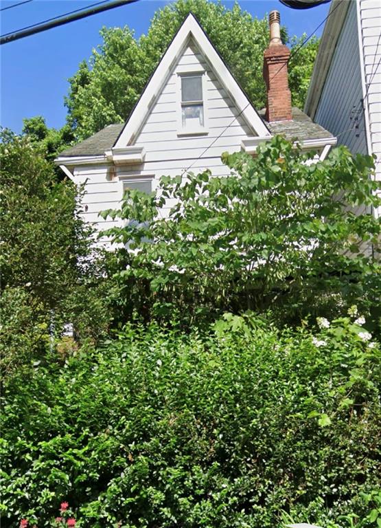 a view of a backyard of the house