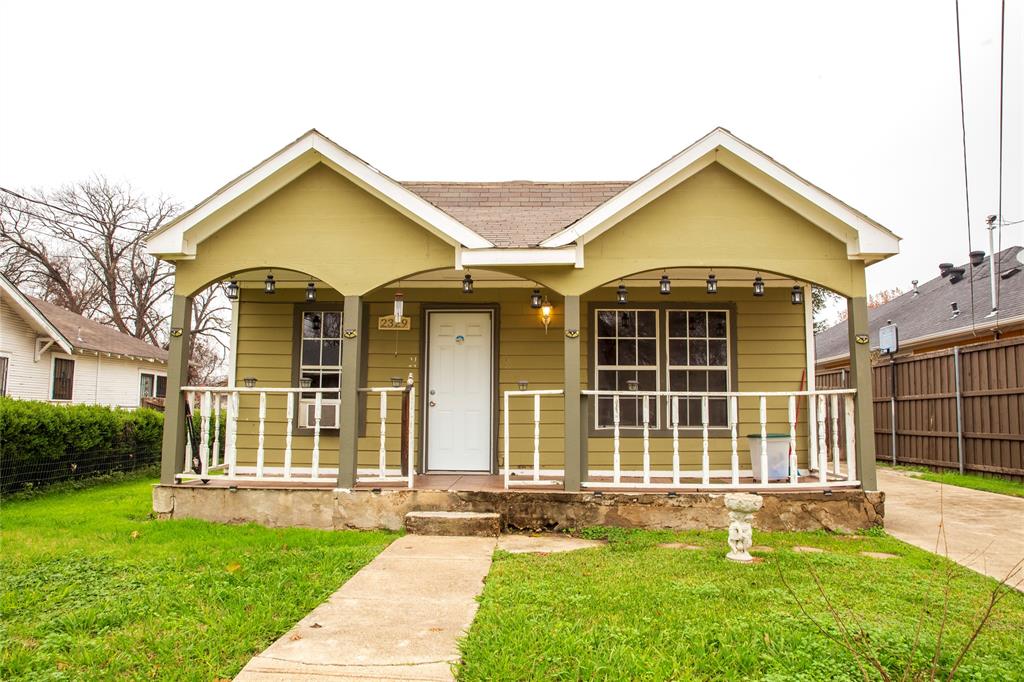 front view of a house with a yard