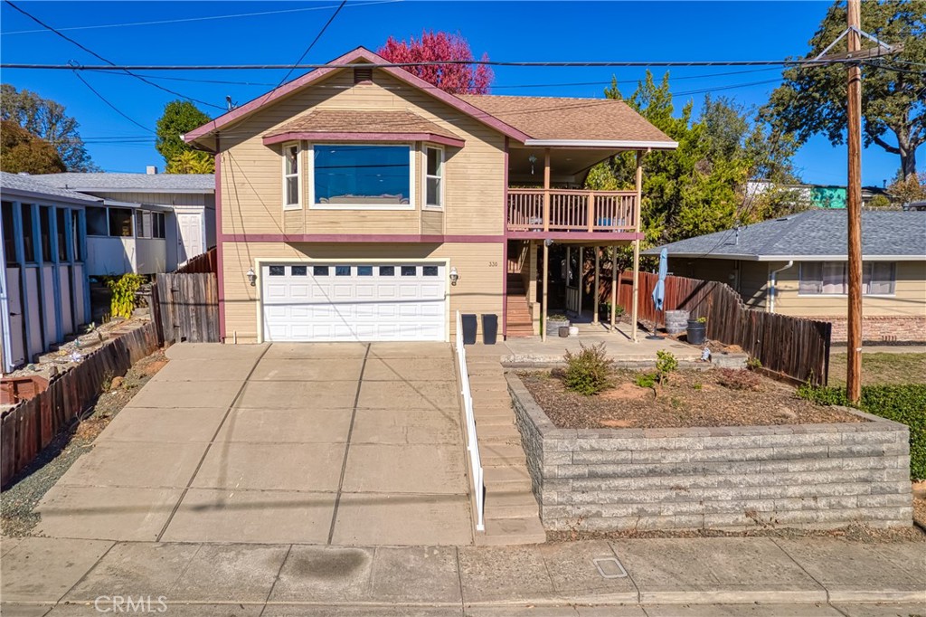 a view of house with outdoor space