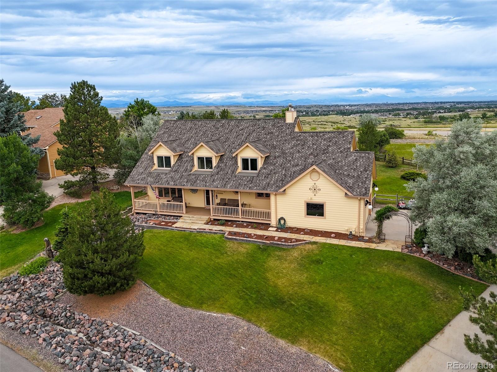 a view of a house with a big yard