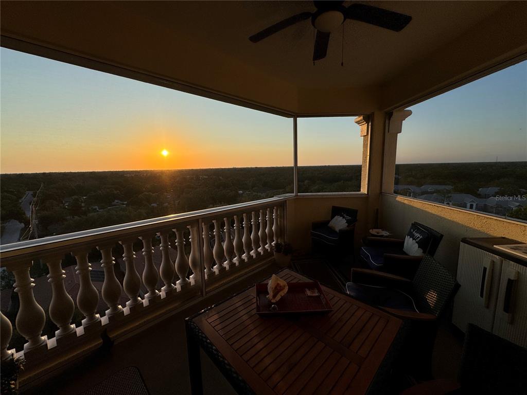 a balcony with wooden floor