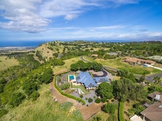 an aerial view of residential house with outdoor space