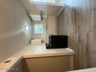 a kitchen with stainless steel appliances wooden cabinets and a sink