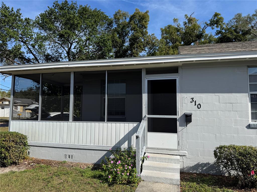 a view of a back yard of the house