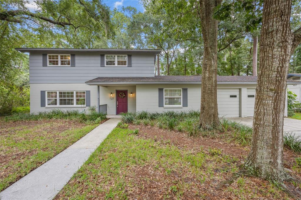 front view of a house with a yard