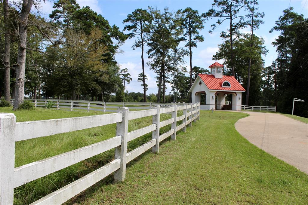 a view of a house with a yard porch and sitting area