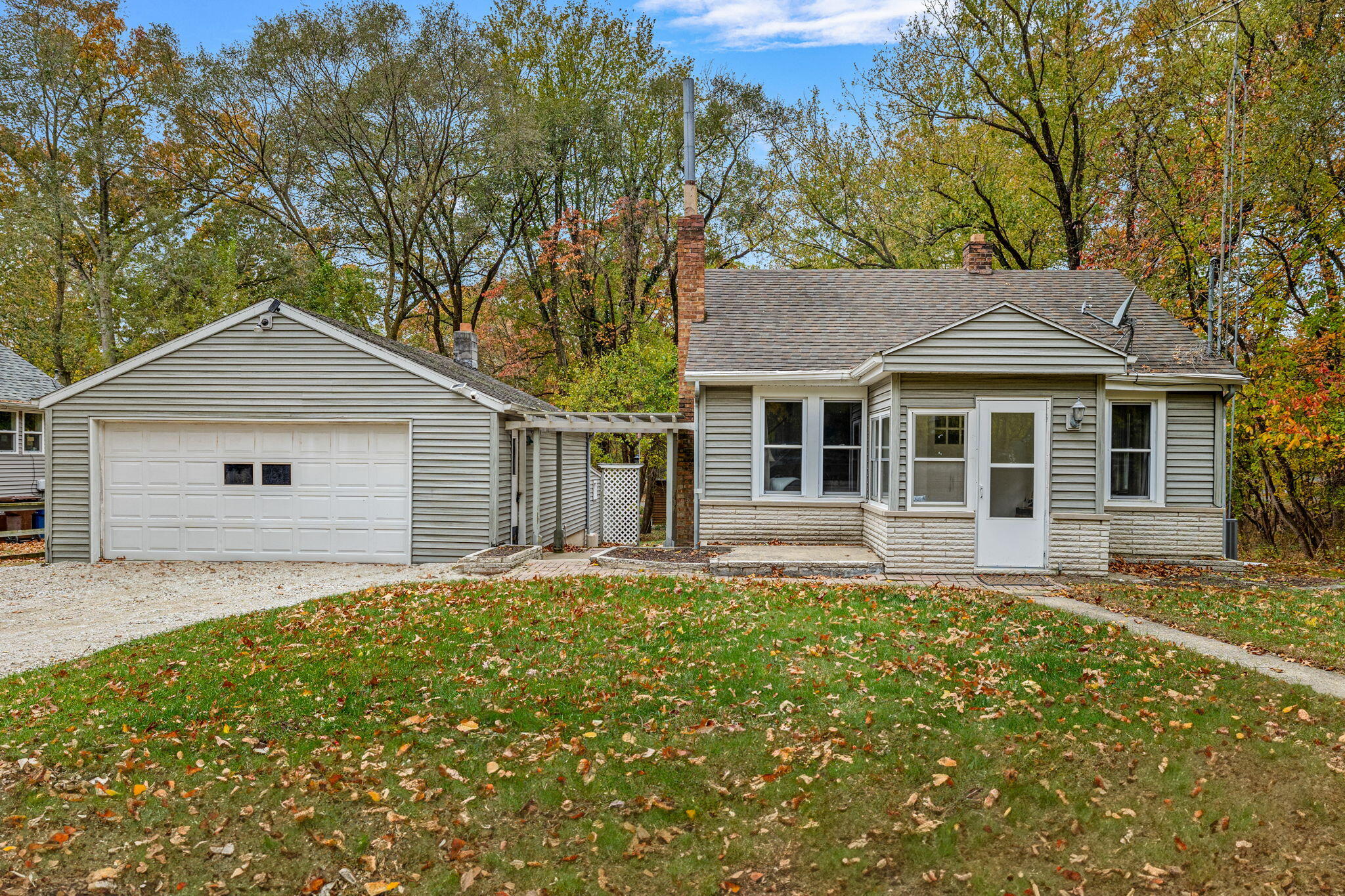 front view of a house with a yard