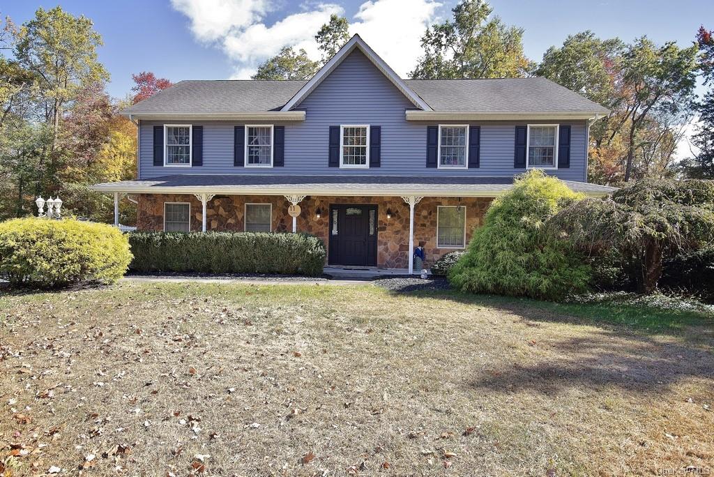 View of front facade featuring covered porch